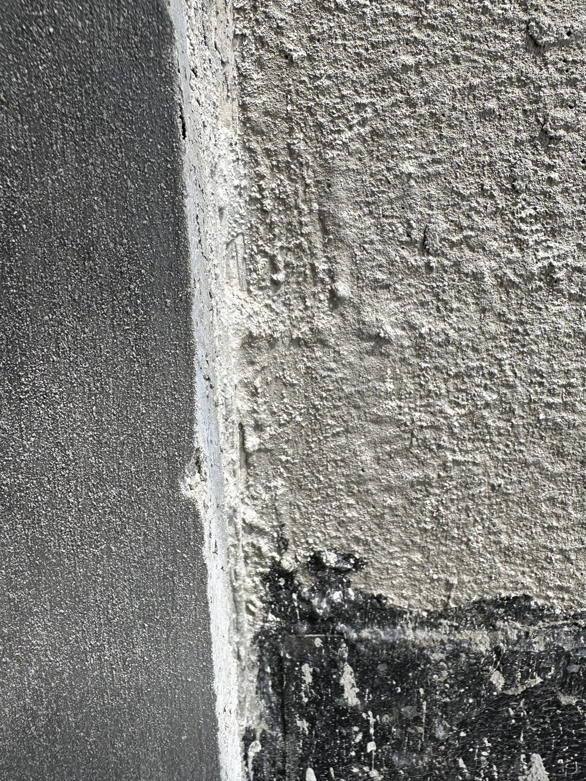Plaster layers at a concrete and block joint