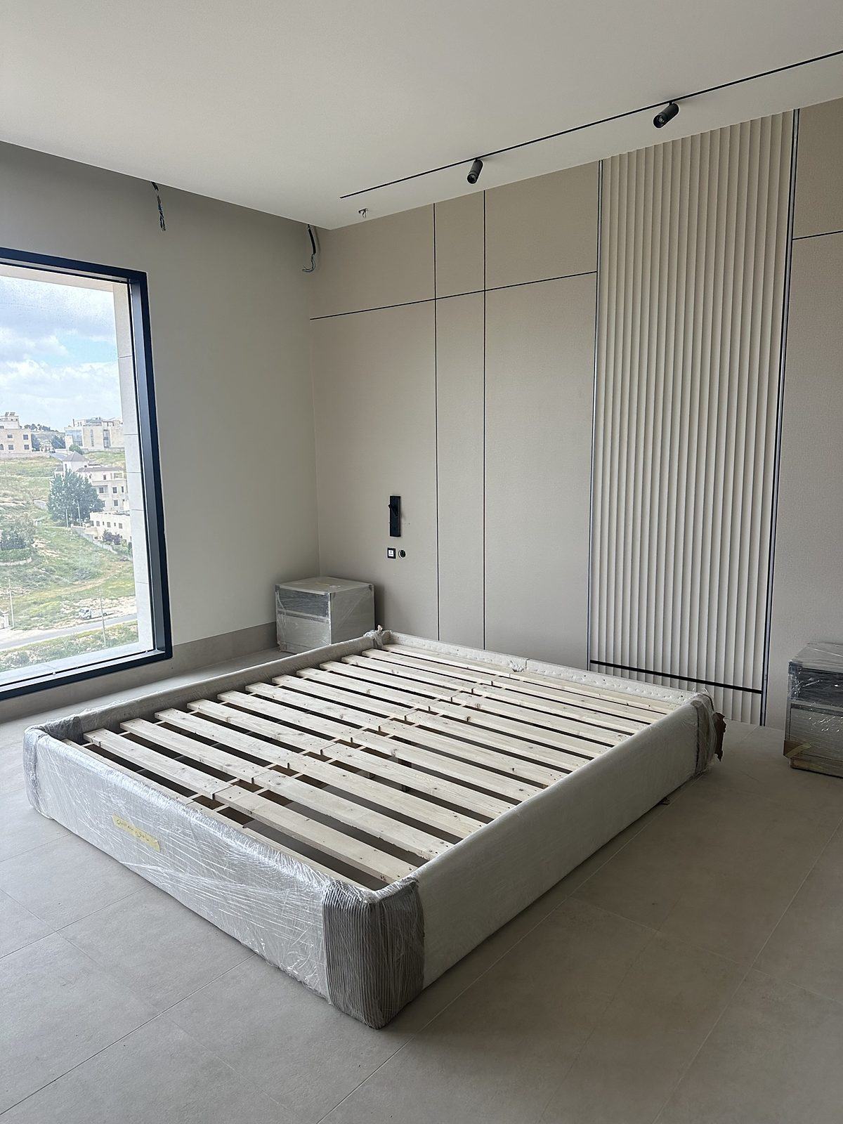 Bedroom wall panelling with fluted feature
