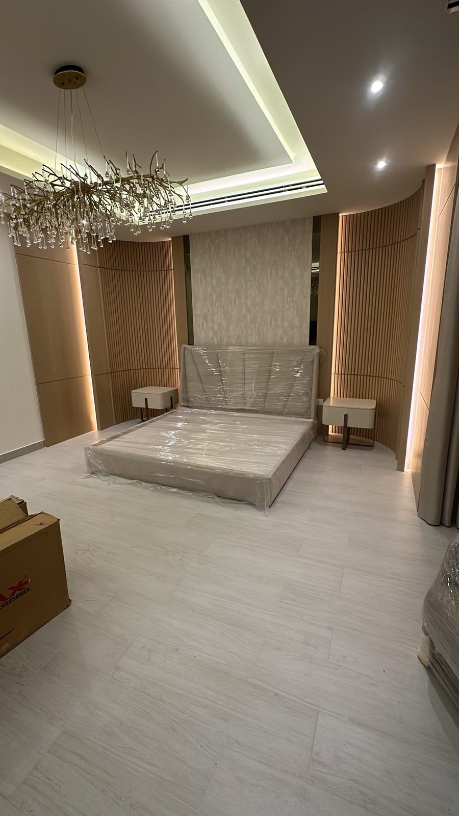Master bedroom with chandelier